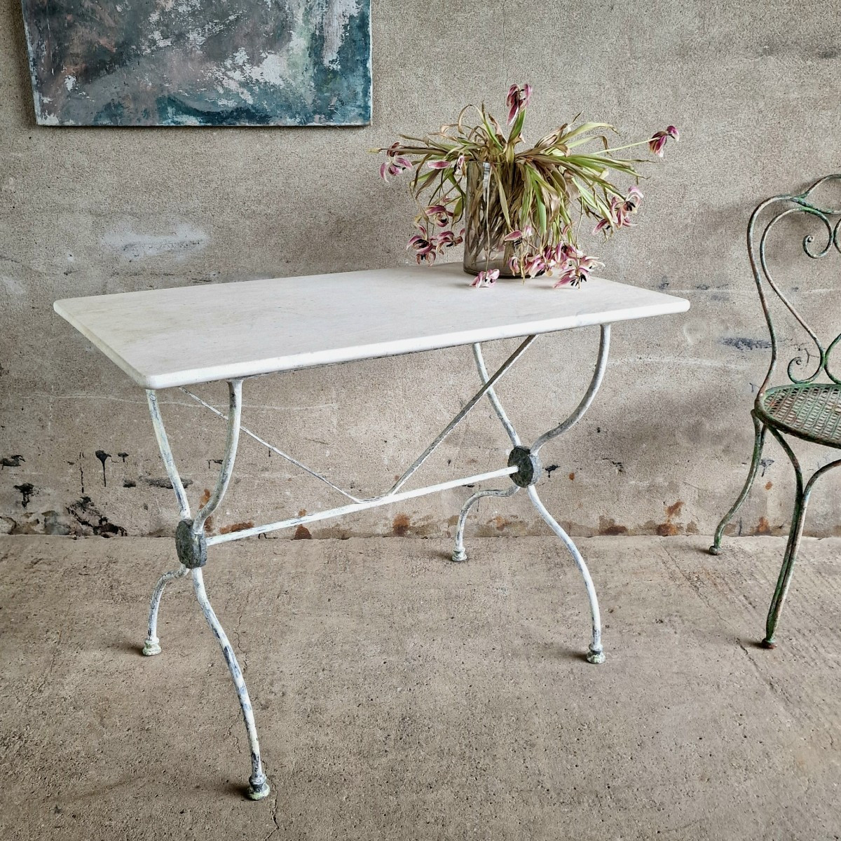 Table de bistrot avec plateau en marbre