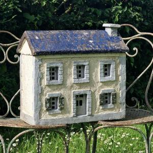Maison en pierre reconstituée