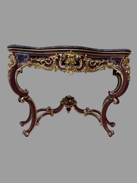A Lacquered And Gilt Wood Console 