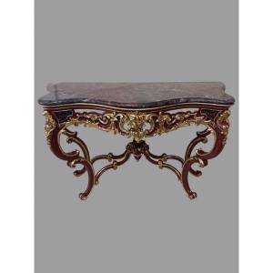 A Lacquered And Gilt Wood Console 