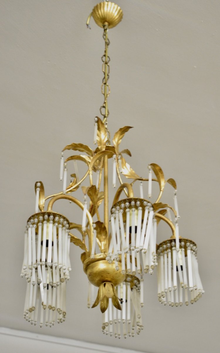 Chandelier In Golden Iron And Crystal Pendeloques