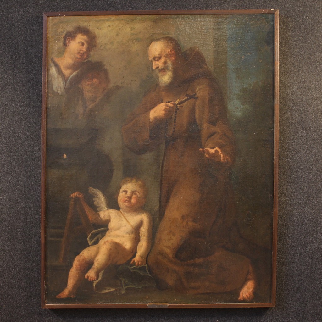Tableau ancien du 17ème siècle, saint franciscain en prière avec des chérubins
