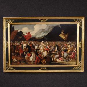 Grand tableau flamand sur panneau du 17ème siècle, bataille entre chevaliers et Amazones