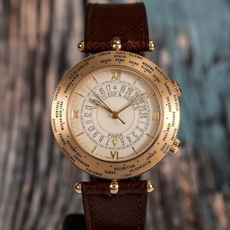 Van Cleef & Arpels  Traveler World Time Alarm Or Jaune 18kts -1990-