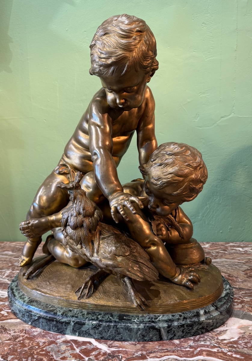 Bronze "Enfants essayant d'attraper un coq"