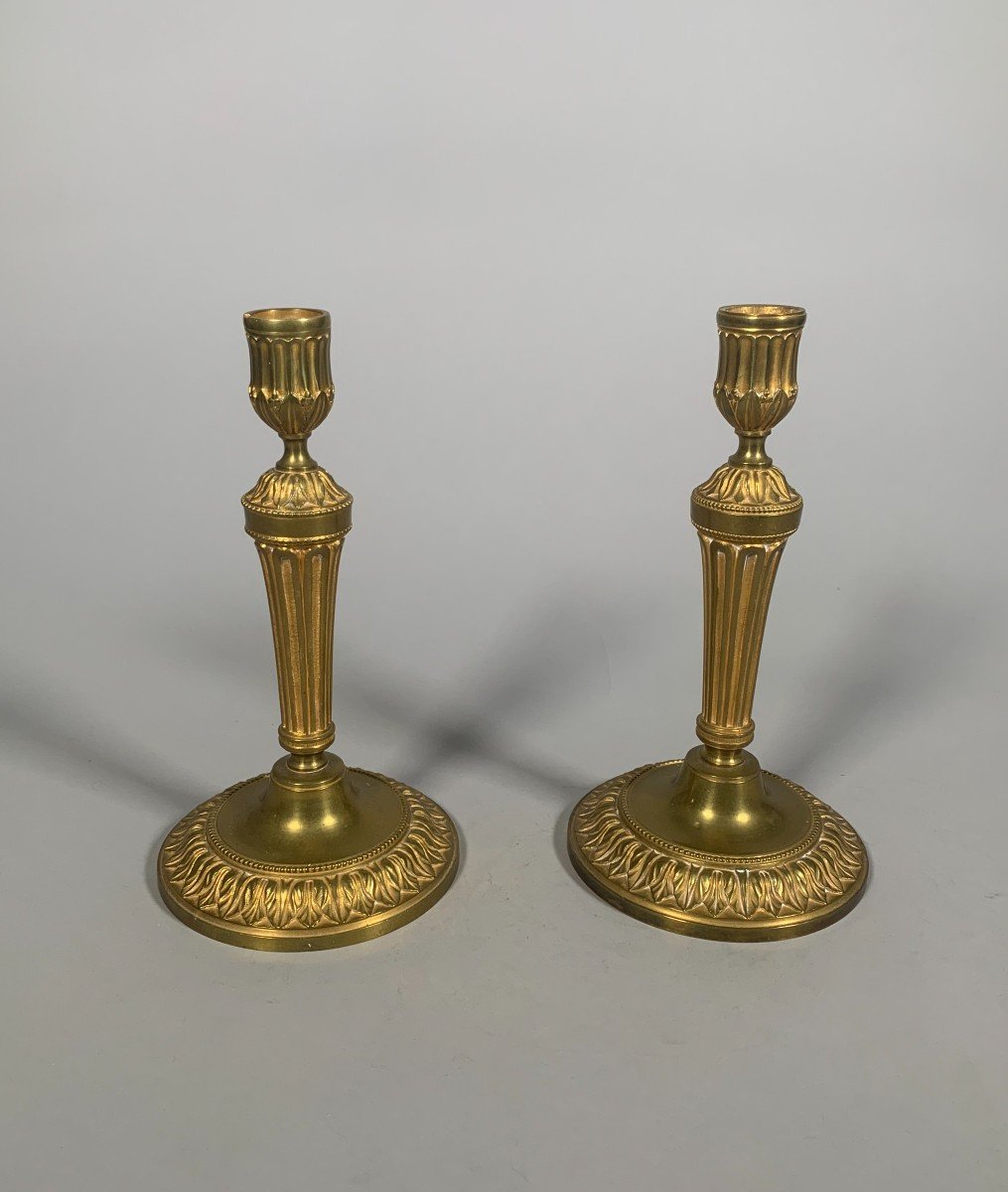 Louis XVI Period Candlesticks In Chiseled And Gilded Bronze.