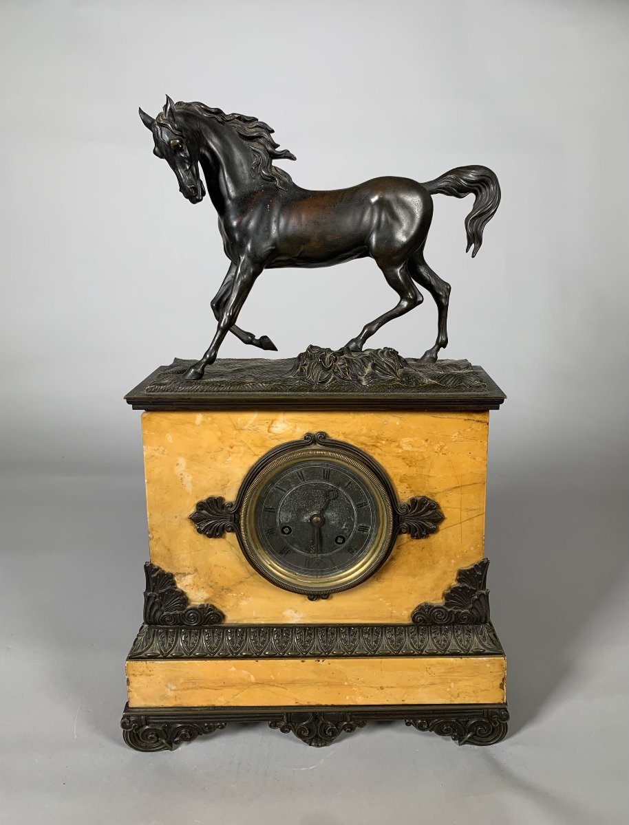 Charles X-style "au Cheval" Clock In Sienna Yellow Marble; 19th-century Restoration