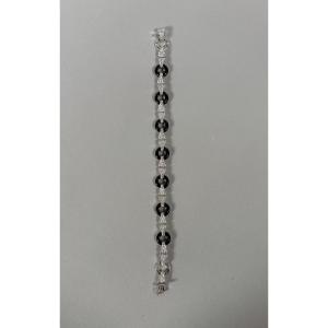 Bracelet géométrique Art déco  en or gris onyx noir et diamants  XXeme siecle