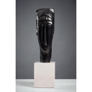 Amédéo Modigliani (1884-1920) Sculpture  "Tête de jeune fille à la frange"  