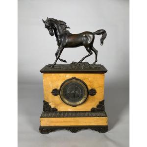 Charles X-style "au Cheval" Clock In Sienna Yellow Marble; 19th-century Restoration