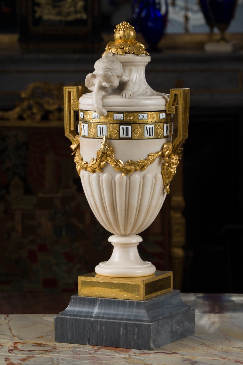 Clock With Rotating Circles In White Marble, Blue Turquin Marble And Chiseled And Gilded Bronze