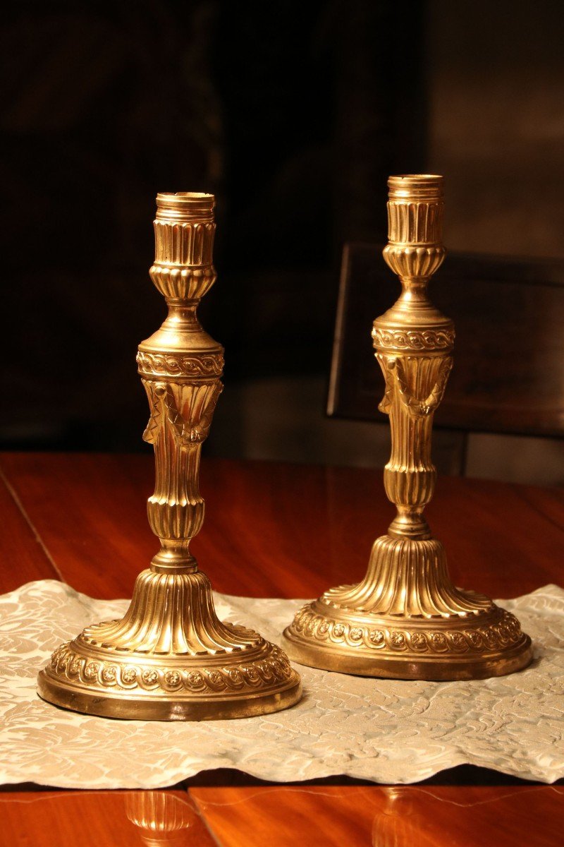 Pair Of Candlesticks In Gilt Bronze And Chiseled