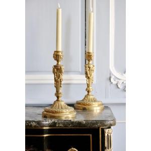 Pair Of Gilt And Chiseled Bronze Candlesticks