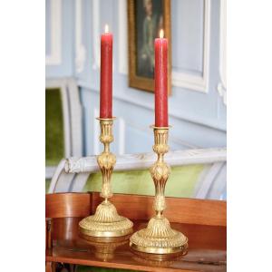 Pair Of Candlesticks In Gilt And Chiseled Bronze