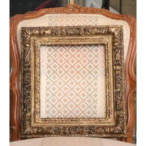 Cadre en bois doré et sculpté d’poque Louis XIV