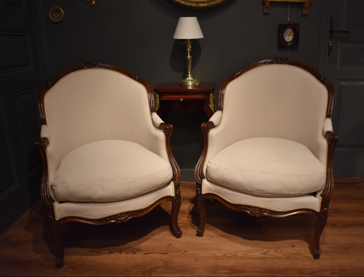 Pair Of Walnut Bergere Chairs