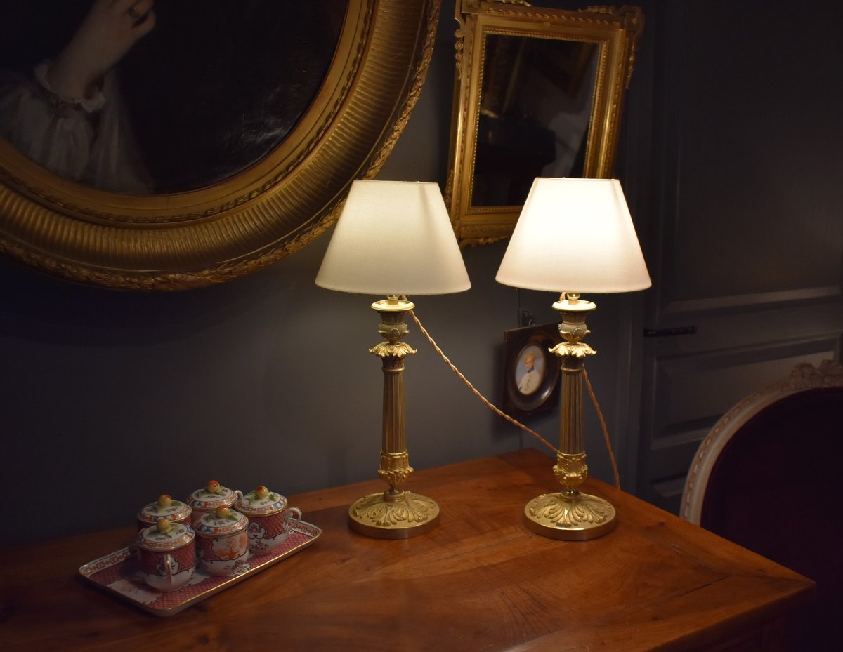 Paire de lampes en bronze doré, à deux patines
