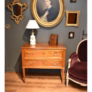 Commode sauteuse en noyer