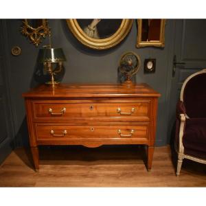 Commode sauteuse en noyer