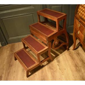 Escabeau de bibliothèque transformable en fauteuil
