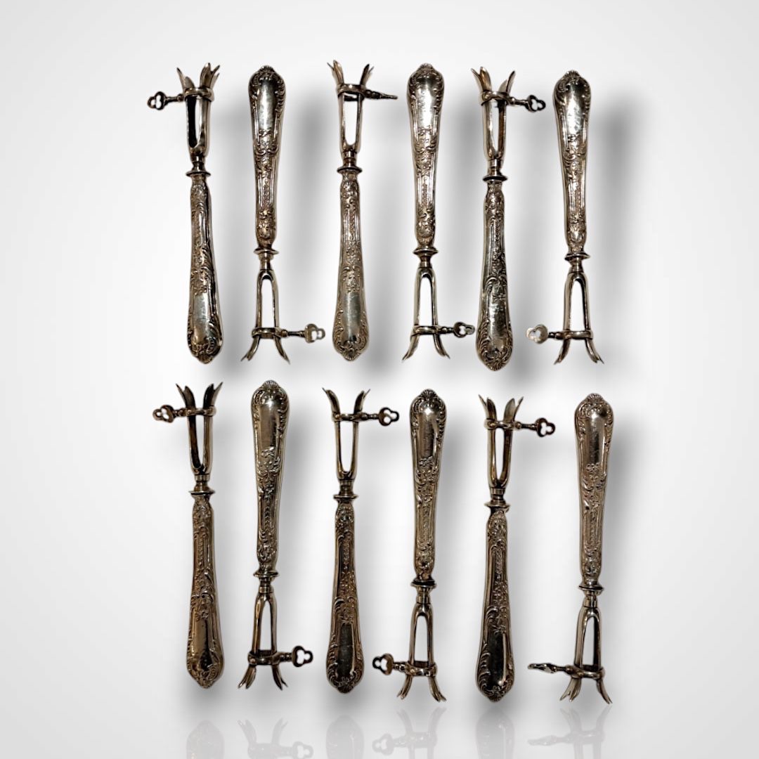 Set Of Twelve Silver-plated Chop Handles, Late 19th Century