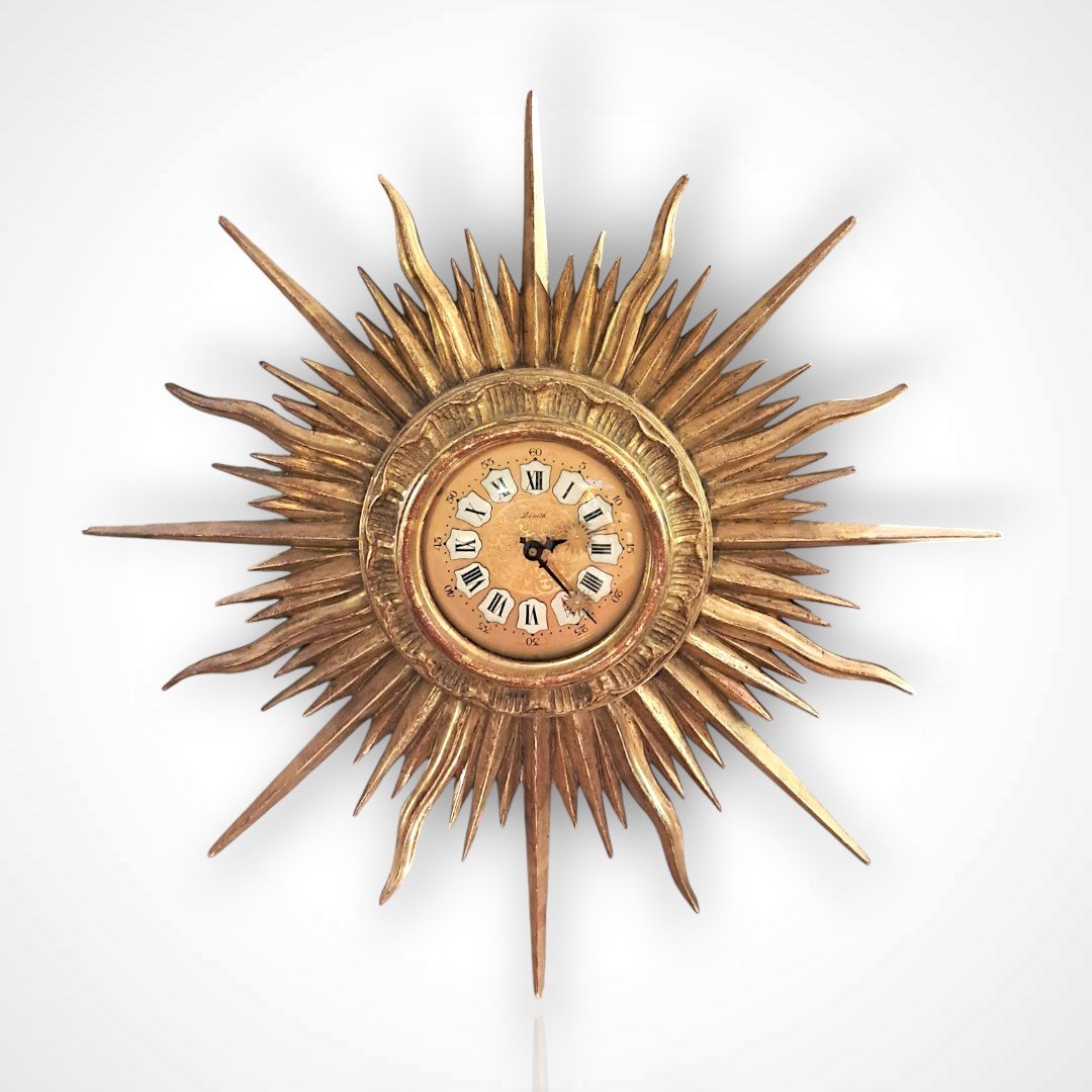Horloge soleil en bois doré, Zenith, XXe