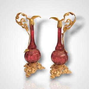 Paire d’aiguières en verre à monture en métal doré, XIXe
