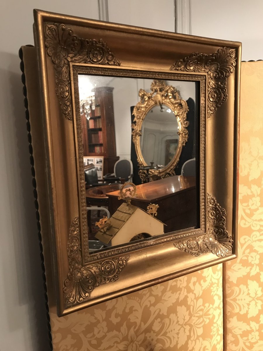 Petit miroir d’époque Empire bois doré 