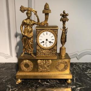 Horloge d’époque Empire « Les Moissons » en bronze doré