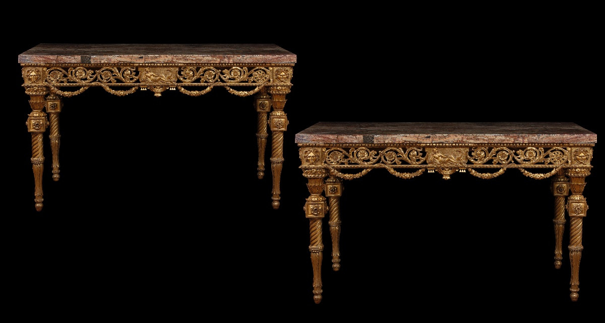 Paire de consoles Louis XVI en bois doré et sculpté avec plateau plaqué d'albâtre