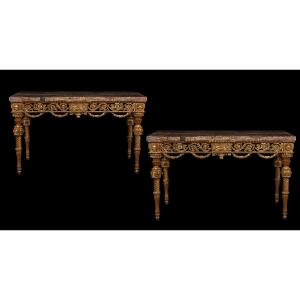 Paire de consoles Louis XVI en bois doré et sculpté avec plateau plaqué d'albâtre