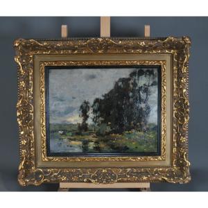 Lucien Frank (1857+1920) Paysage avec vaches au bord d’une rivière