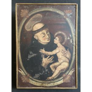 Huile sur métal 17ème école sud-américaine représentant StAntoine de Padoue et l’enfant Jesus
