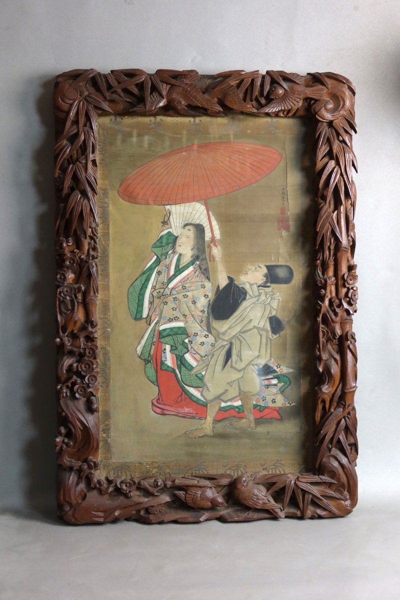 Grand cadre sculpté avec sa peinture asiatique