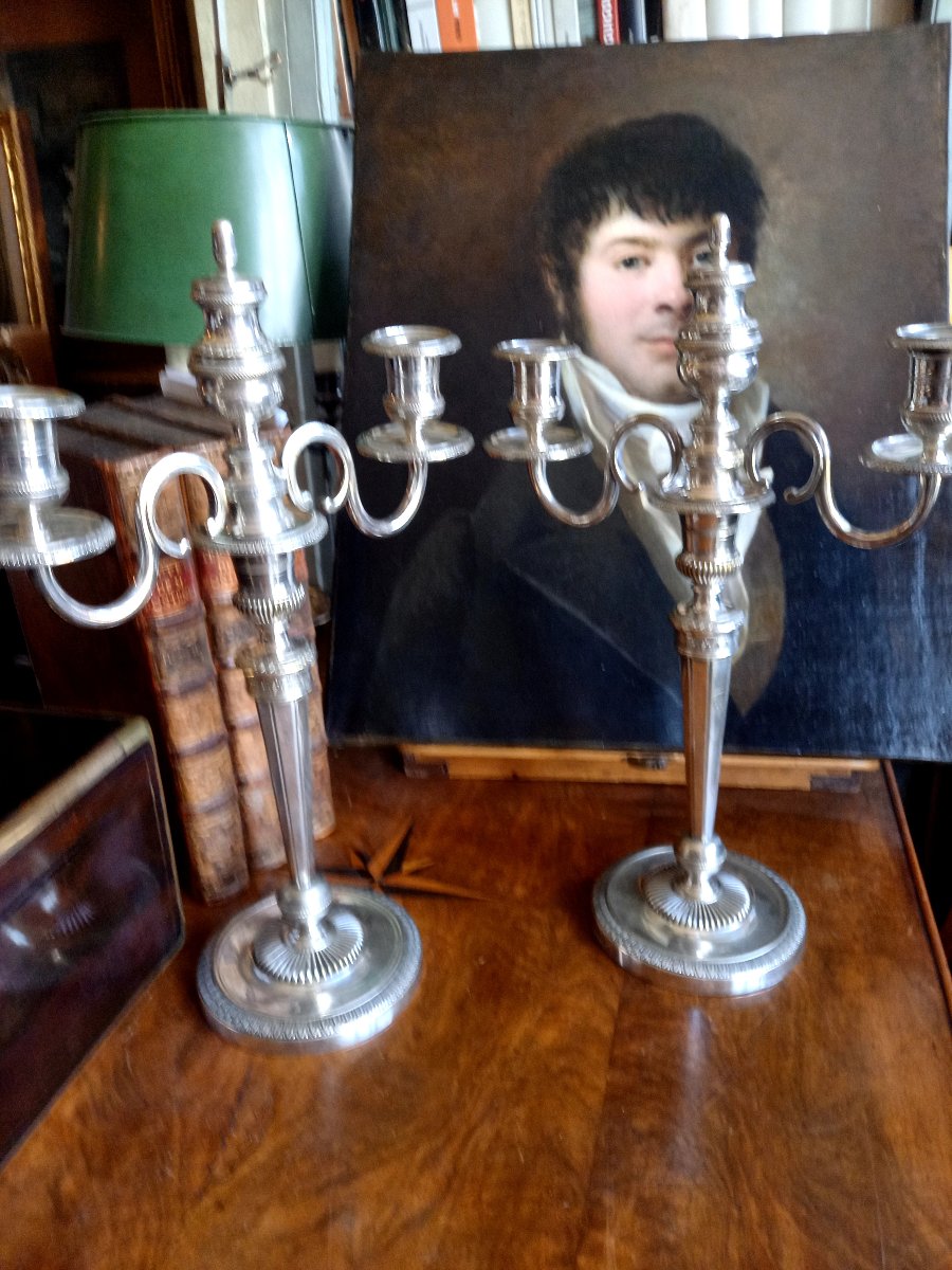Paires de chandeliers directoires en métal argenté 