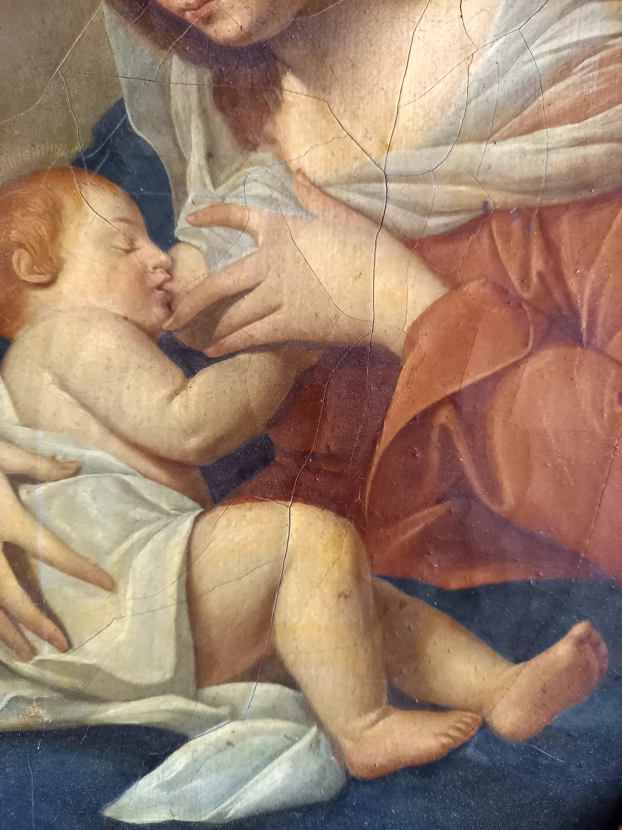 D'après Francesco Guarino . La Vierge allaitant l'enfant Jésus -photo-1
