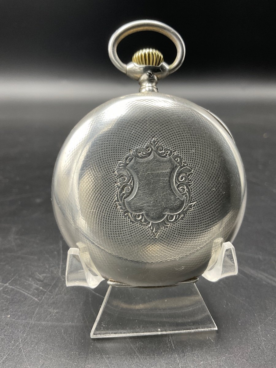 Orion Gusset Or Pocket Watch In Sterling Silver With Chiseled Decor Of A Coat Of Arms And Guilloche.-photo-2