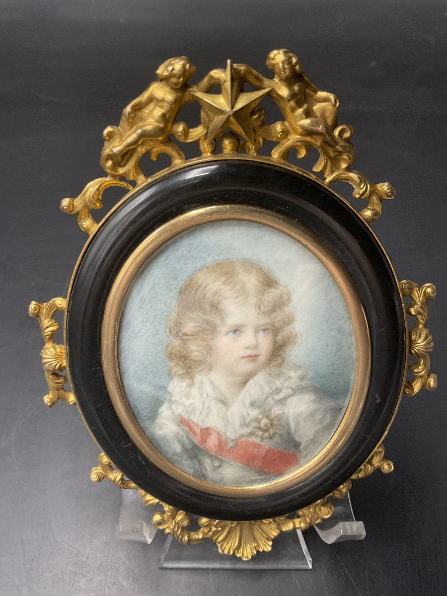 Miniature Painted On Oval Ivory Under Glass Representing The Child King Of Rome With His Frame.