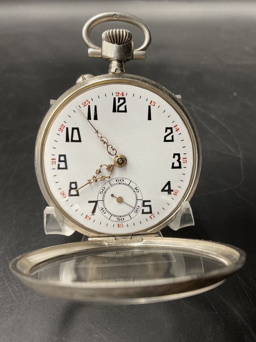Montre à gousset ou de poche en argent massif à décor de rinceau floral et écusson.-photo-5