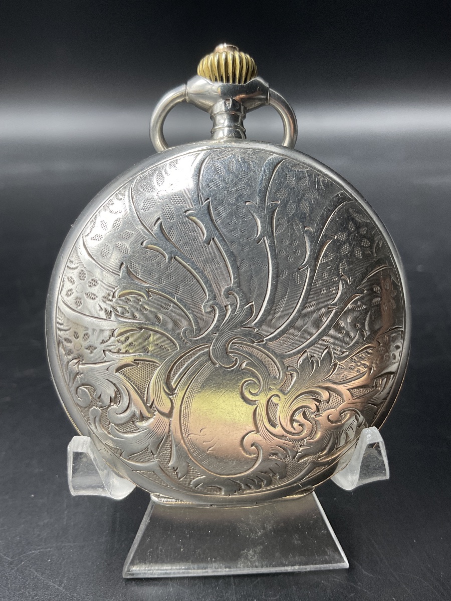 – Montre à gousset ou de poche savonnette de marque Omega en argent à décor de rinceaux fleuris-photo-3
