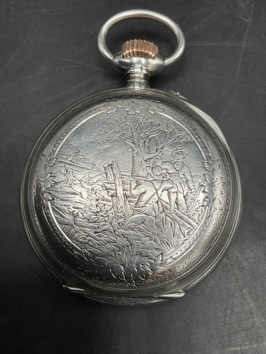 Montre à gousset ou de poche en argent massif ciselé et guilloché, décor d'une scène de chasse.-photo-4