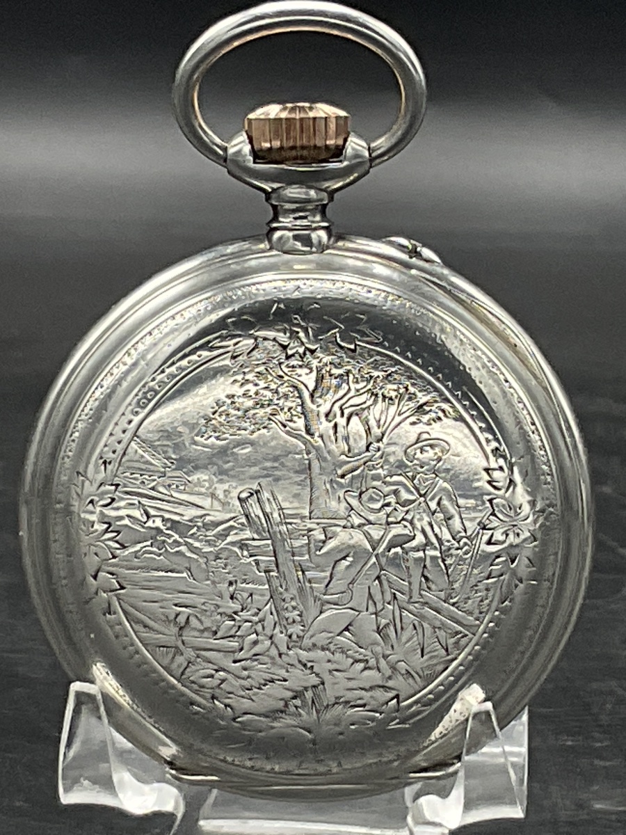 Montre à gousset ou de poche en argent massif ciselé et guilloché, décor d'une scène de chasse.-photo-8