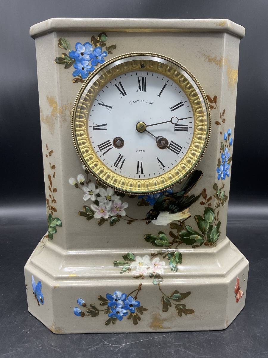 A Longwy Polychrome Slip-glazed Cornice Clock Decorated With Butterflies, Birds, And Flowers
