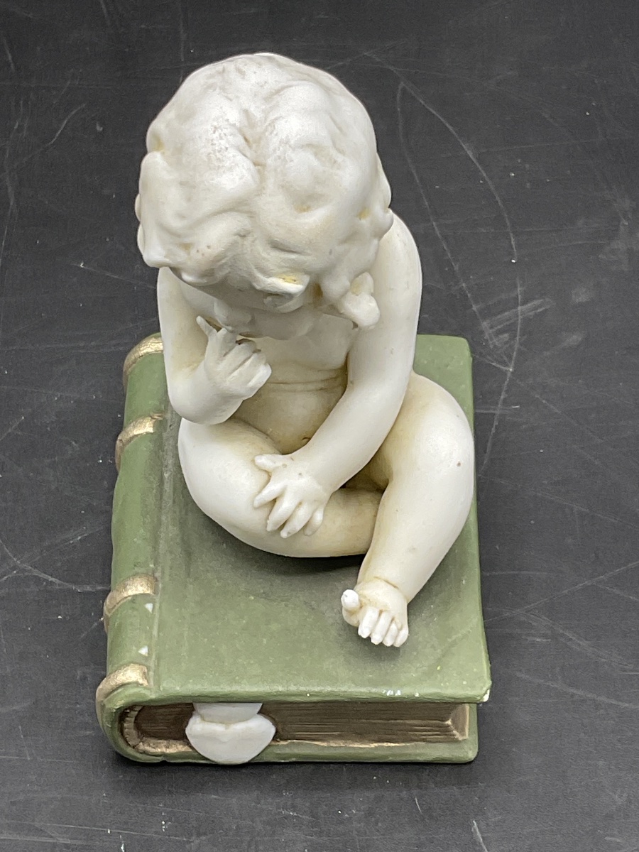 A Biscuit Attributed To La Manufacture De Müller, Depicting A Little Girl Sitting On A Book.-photo-1