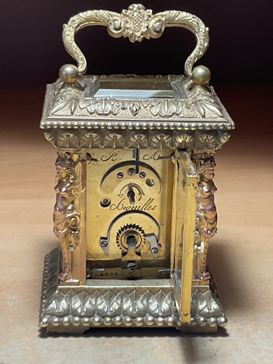 Officer Or Miniature Travel Clock With Caryatids In Golden Chiseled Bronze.-photo-3