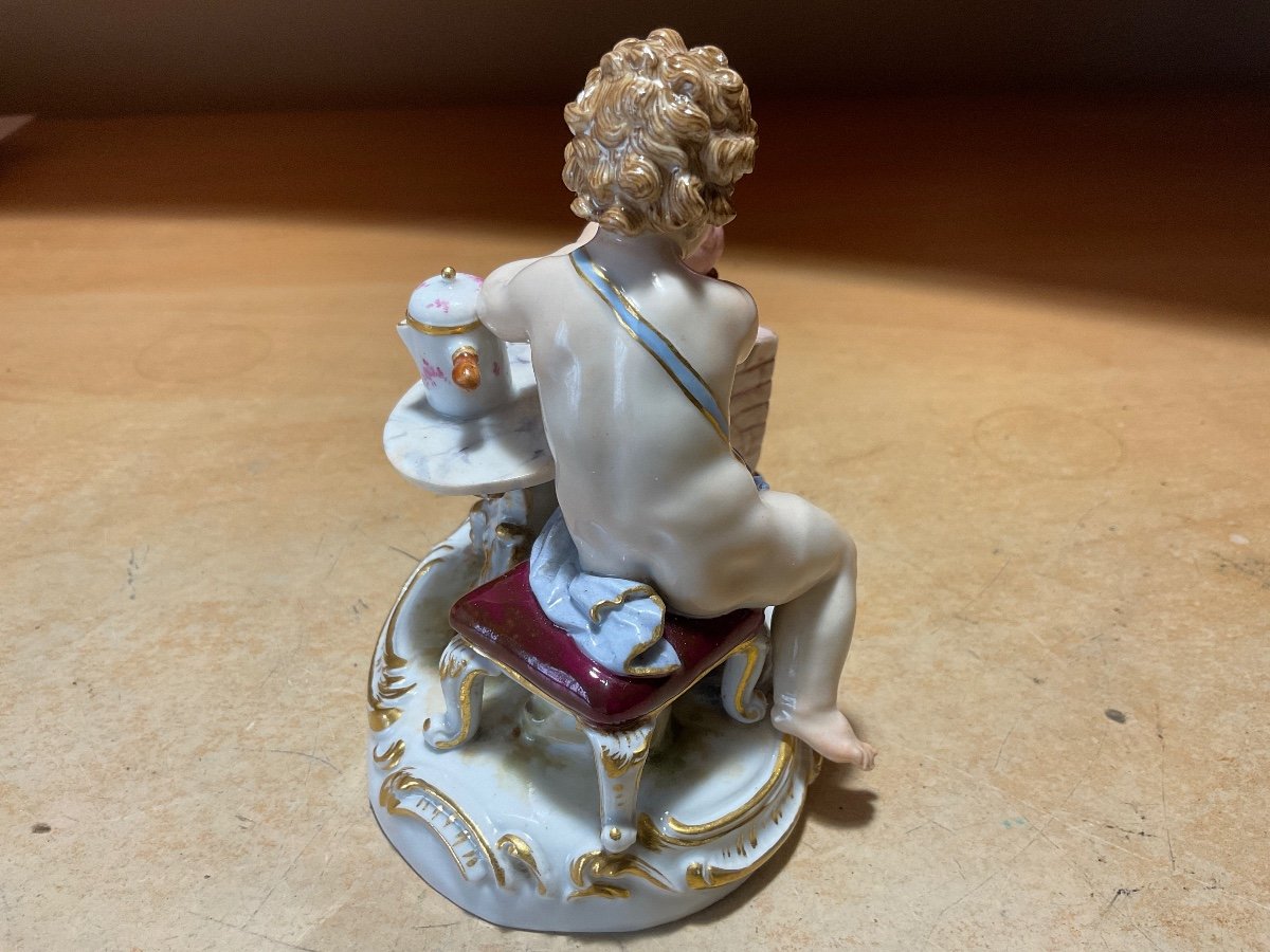 Polychrome Meissen Porcelain Representing A Putti Preparing His Chocolate.-photo-1