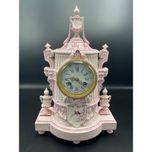 Louis XVI Polychrome Pendulum With Column In Gien Earthenware On A Pink Background.