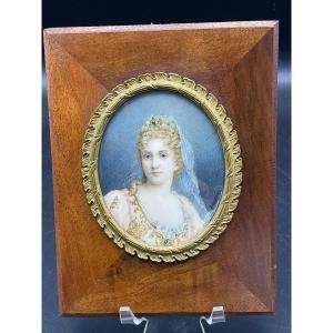 Miniature On Polychrome Ivory Representing A Young Blonde Woman With Brown Eyes Signed Bernard.