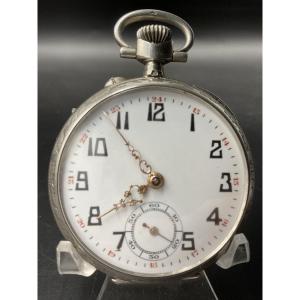 Solid Silver Pocket Watch Or Fob Watch With Floral Scroll And Crest Decoration.