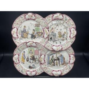 Plateau à quatre assiettes en faïence polychrome de Sarreguemines décor de Froment Richard.
